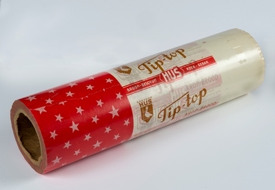 2010-0004-HHI 1.jpg; 2010-0004-HHI; Rol met pakpapier voor broodproduct van de vm. firma Hus.; pakpapier